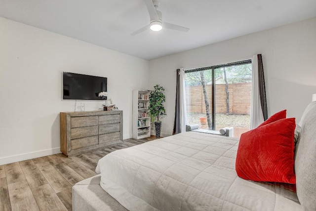11300 Lake Dr, Austin, TX 78748 - bedroom featuring wood finished floors, access to outside, and a ceiling fan