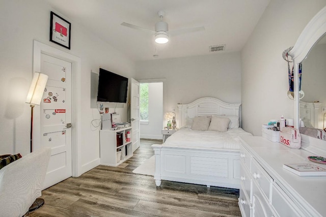 11300 Lake Dr, Austin, TX 78748 - bedroom featuring wood finished floors and a ceiling fan