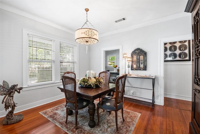 603 E Liberty Ave, Round Rock, TX 78664 - dining room featuring dark wood-style flooring and baseboards