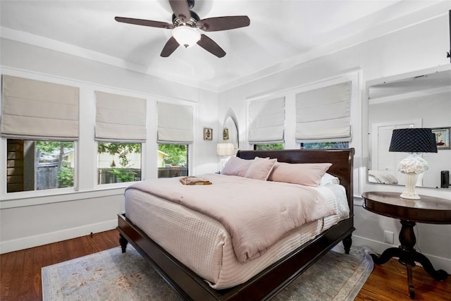 603 E Liberty Ave, Round Rock, TX 78664 - bedroom featuring wood finished floors and ceiling fan