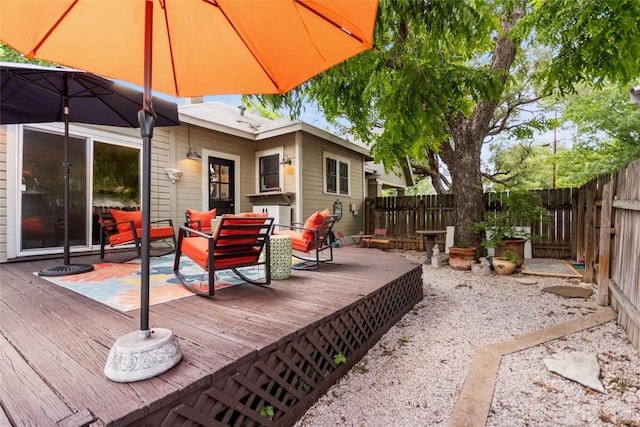 603 E Liberty Ave, Round Rock, TX 78664 - wooden deck featuring a fenced backyard and outdoor lounge area