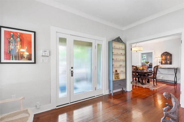 603 E Liberty Ave, Round Rock, TX 78664 - doorway with crown molding and wood finished floors