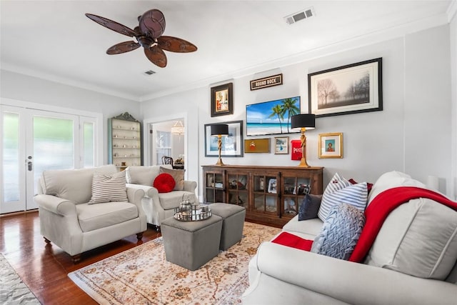 603 E Liberty Ave, Round Rock, TX 78664 - living area featuring ceiling fan, wood finished floors, and ornamental molding
