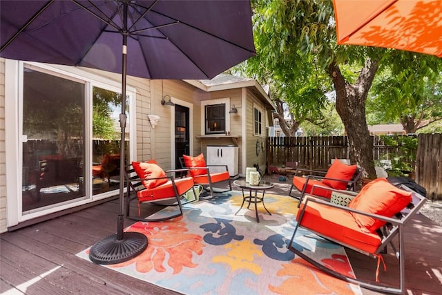 603 E Liberty Ave, Round Rock, TX 78664 - wooden terrace with an outdoor hangout area