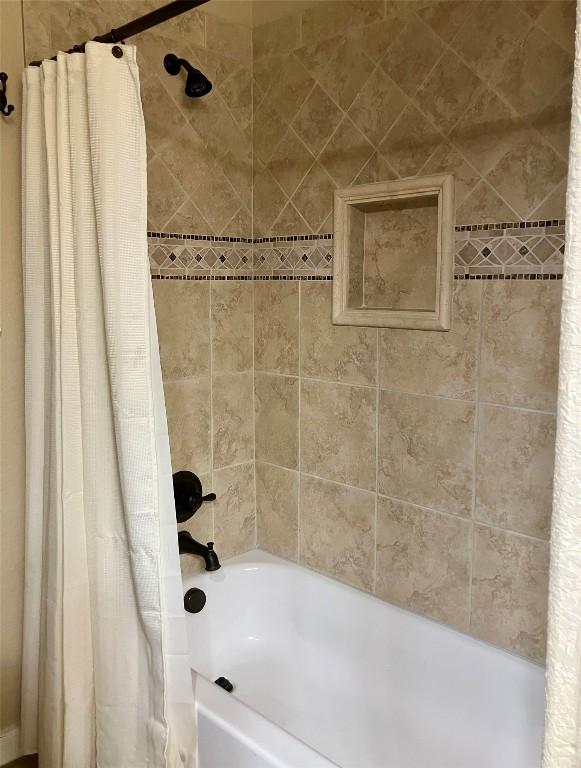 129 S Abrego Xing S, Floresville, TX 78114 - full bathroom with shower / bath combo