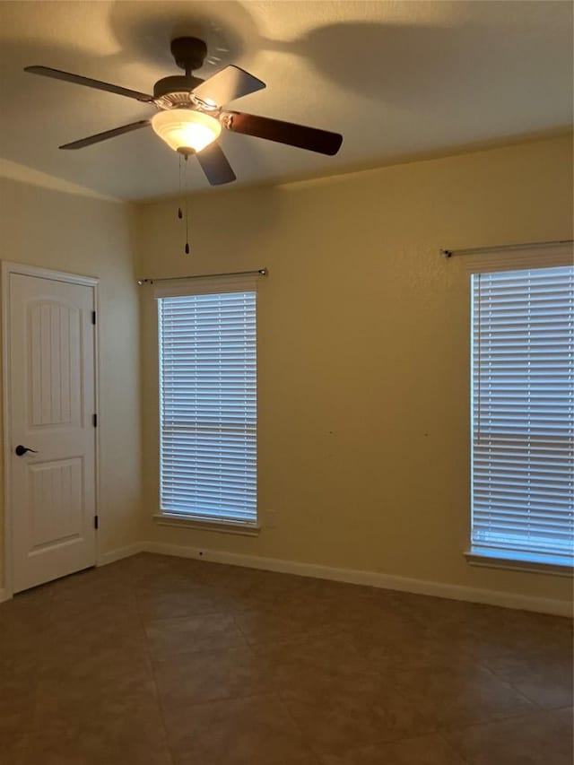 129 S Abrego Xing S, Floresville, TX 78114 - unfurnished room with tile patterned flooring and baseboards