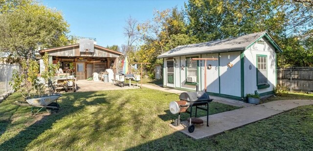 807 W Monroe St, Austin, TX 78704 - view of yard with an outdoor structure, a patio, and cooling unit