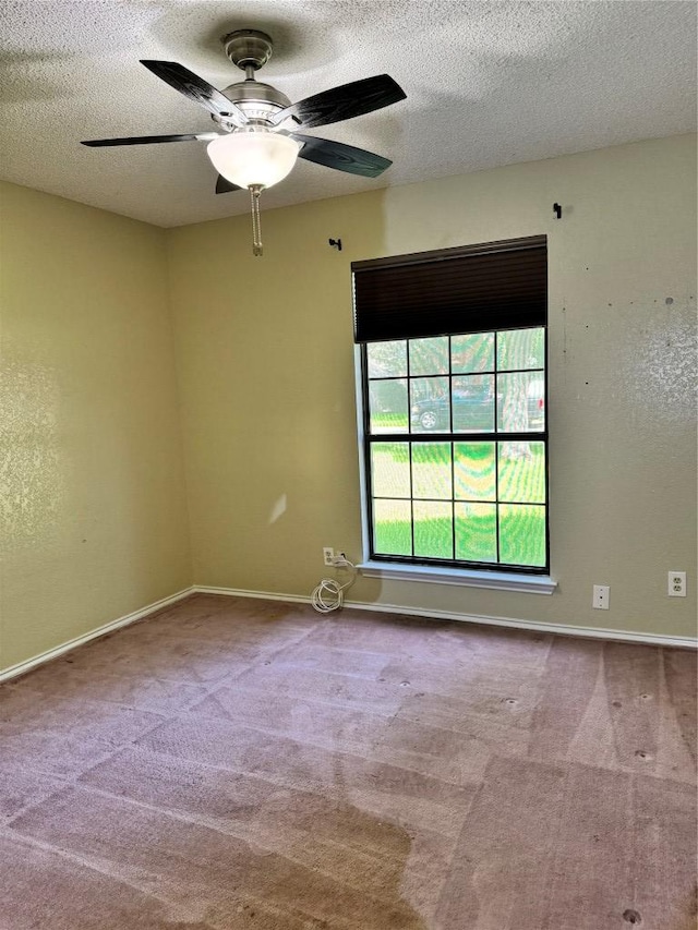 1000 Twin Creek Dr, Pflugerville, TX 78660 - carpeted empty room with a textured ceiling and a ceiling fan