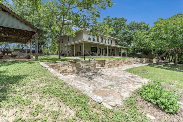 2308 Flite Acres Rd, Wimberley, TX 78676 - back of house featuring a patio