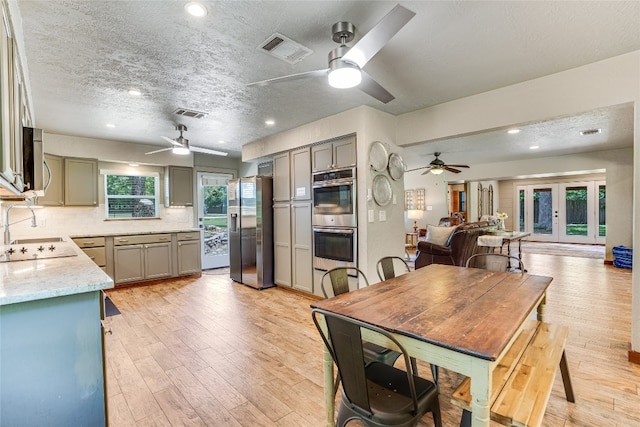 2308 Flite Acres Rd, Wimberley, TX 78676 - dining space featuring ceiling fan, light wood-type flooring, a textured ceiling, and recessed lighting