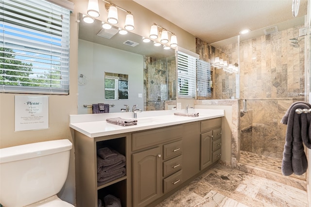 2308 Flite Acres Rd, Wimberley, TX 78676 - full bath featuring a shower stall and double vanity