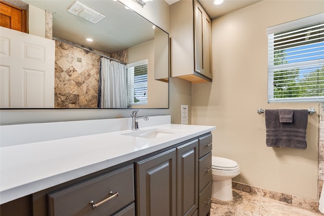 2308 Flite Acres Rd, Wimberley, TX 78676 - bathroom with vanity, a shower with curtain, recessed lighting, and stone finish floors