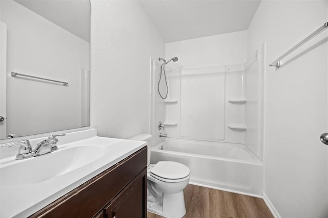 9207 Sandyford Ct, Killeen, TX 76542 - full bath featuring wood finished floors, vanity, and tub / shower combination