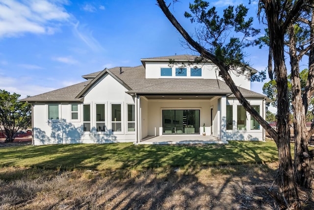 4612 Destination Way, Jonestown, TX 78645 - rear view of house with a patio area, stucco siding, a yard, and a shingled roof