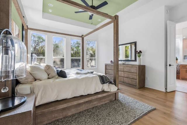 4612 Destination Way, Jonestown, TX 78645 - bedroom featuring light wood finished floors and ceiling fan