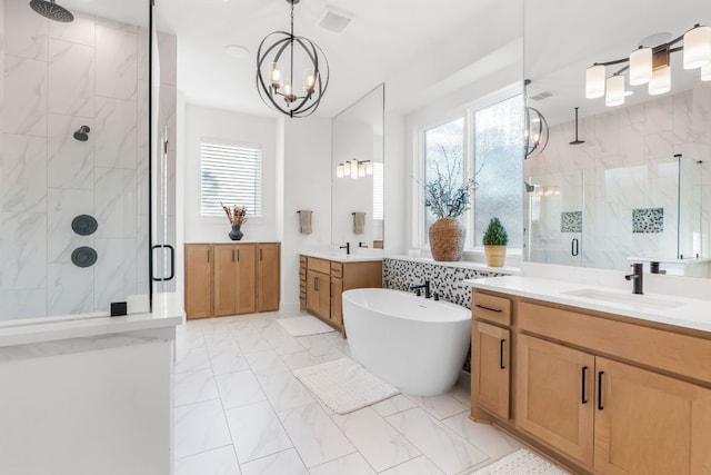 4612 Destination Way, Jonestown, TX 78645 - full bath with a shower stall, two vanities, and healthy amount of natural light