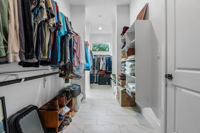 4612 Destination Way, Jonestown, TX 78645 - walk in closet featuring light marble finish flooring