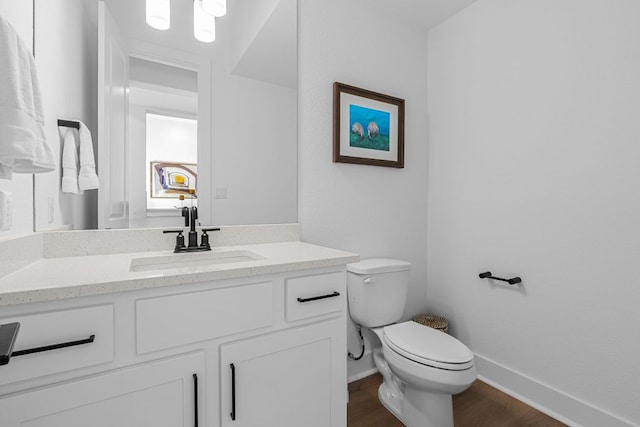 4612 Destination Way, Jonestown, TX 78645 - half bath featuring vanity and wood finished floors
