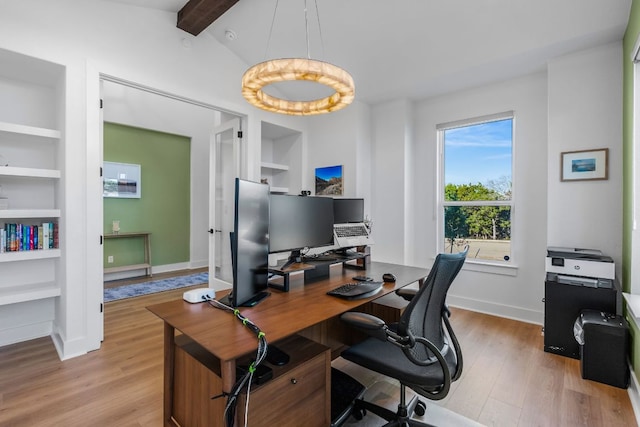4612 Destination Way, Jonestown, TX 78645 - office area with built in features, light wood-style floors, and beam ceiling
