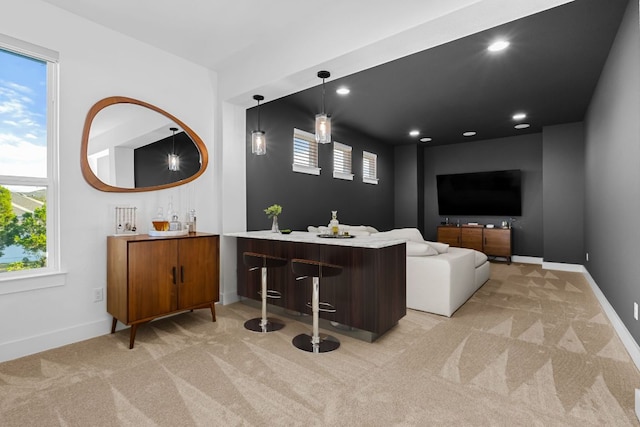 4612 Destination Way, Jonestown, TX 78645 - bar area featuring light colored carpet, recessed lighting, and pendant lighting