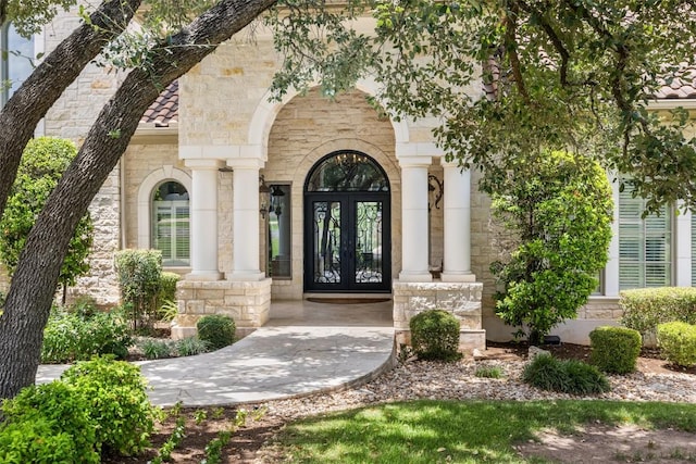 117 Bella Cima Dr, Austin, TX 78734 - doorway to property with french doors and stone siding