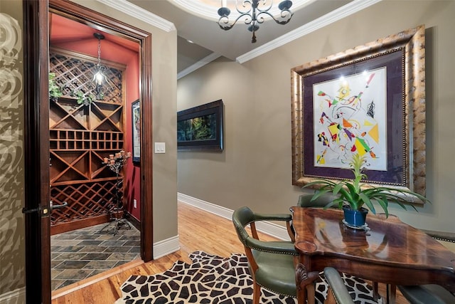 117 Bella Cima Dr, Austin, TX 78734 - wine room featuring ornamental molding, wood finished floors, and a chandelier
