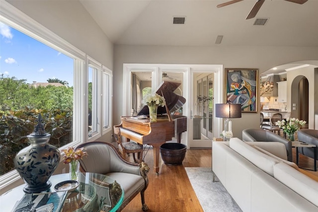 117 Bella Cima Dr, Austin, TX 78734 - sunroom / solarium with lofted ceiling, arched walkways, and french doors