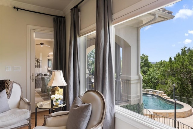 117 Bella Cima Dr, Austin, TX 78734 - sitting room with ornamental molding, a ceiling fan, and wood finished floors