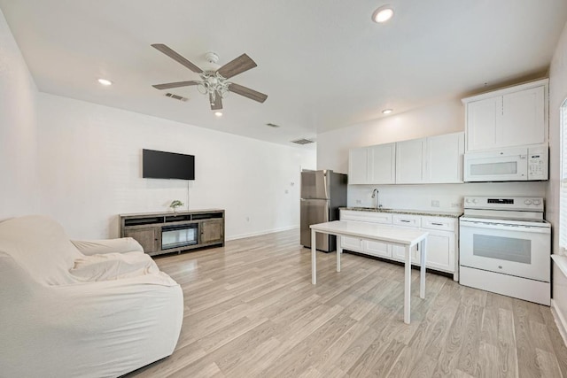 114 Crepe Myrtle Pkwy, Elgin, TX 78621 - living room featuring ceiling fan, light wood-type flooring, and recessed lighting