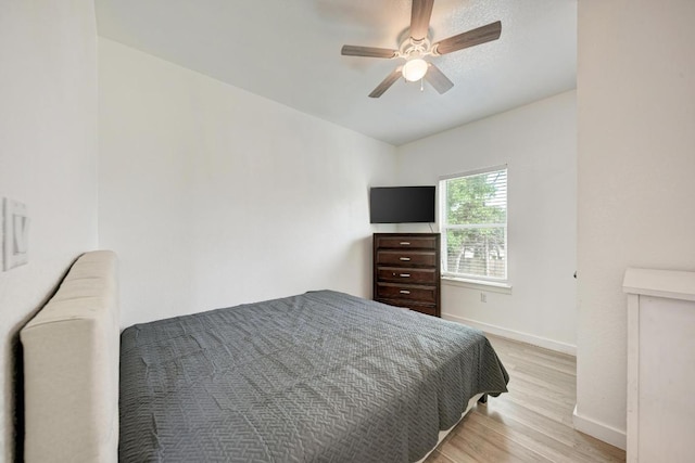 114 Crepe Myrtle Pkwy, Elgin, TX 78621 - bedroom featuring light wood-style flooring and a ceiling fan