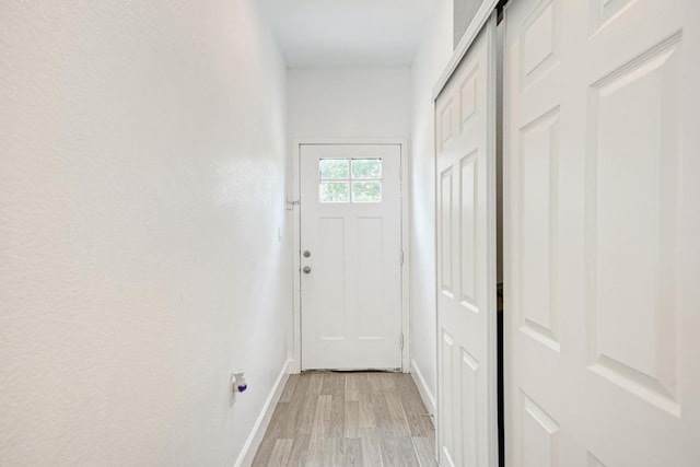 114 Crepe Myrtle Pkwy, Elgin, TX 78621 - entryway with baseboards and light wood-style floors
