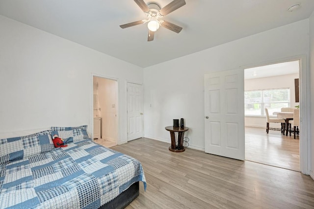 114 Crepe Myrtle Pkwy, Elgin, TX 78621 - bedroom featuring light wood finished floors and a ceiling fan