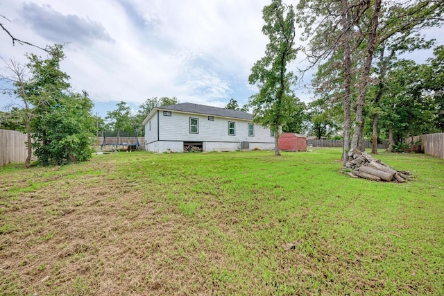 114 Crepe Myrtle Pkwy, Elgin, TX 78621 - fenced backyard featuring a trampoline and a shed