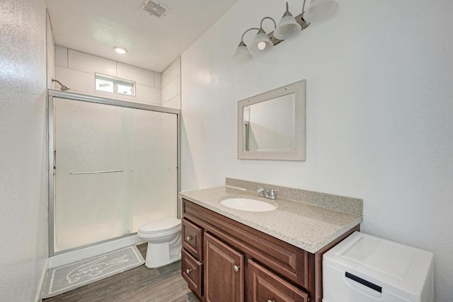 114 Crepe Myrtle Pkwy, Elgin, TX 78621 - full bathroom with a stall shower, vanity, and wood finished floors