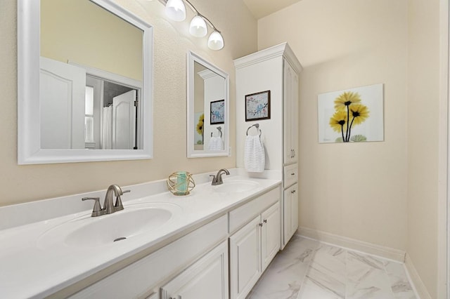 13410 Saddle Back Pass, Austin, TX 78738 - bathroom featuring double vanity and marble finish flooring