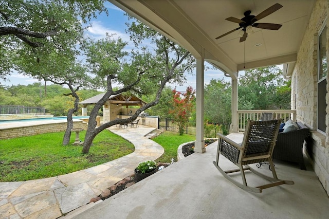 13410 Saddle Back Pass, Austin, TX 78738 - fenced backyard with a ceiling fan and a patio area