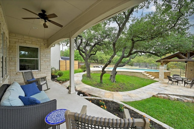13410 Saddle Back Pass, Austin, TX 78738 - fenced backyard featuring ceiling fan and a patio
