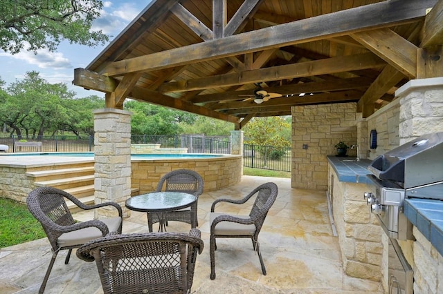 13410 Saddle Back Pass, Austin, TX 78738 - fenced backyard with area for grilling, ceiling fan, a patio area, and a gazebo