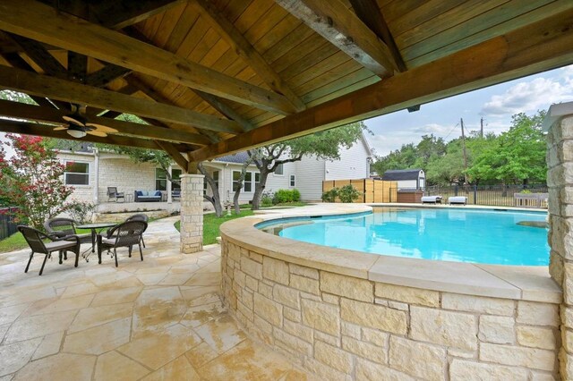 13410 Saddle Back Pass, Austin, TX 78738 - view of swimming pool featuring a fenced backyard, a patio, a gazebo, a storage shed, and outdoor dining area