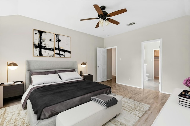 1612 Cora Marie Dr, Pflugerville, TX 78660 - bedroom featuring wood finished floors, a ceiling fan, and connected bathroom