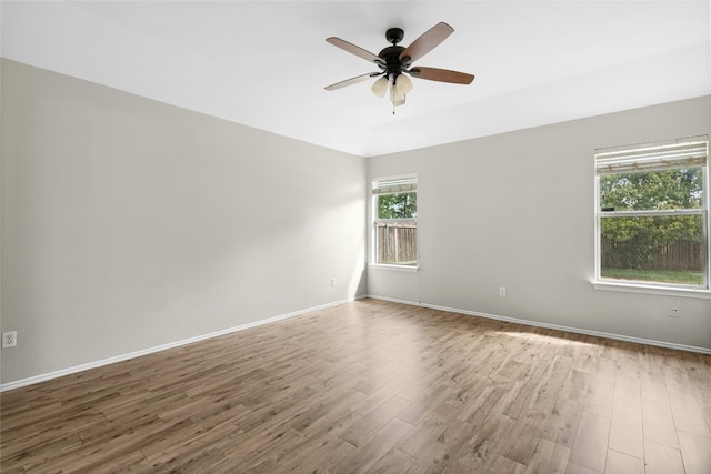1612 Cora Marie Dr, Pflugerville, TX 78660 - unfurnished room with wood finished floors and a ceiling fan