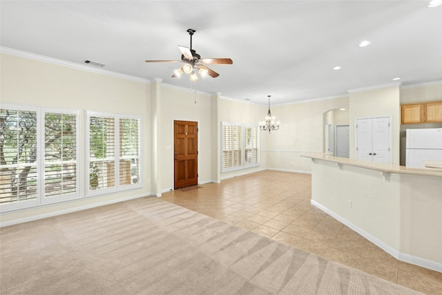 1403 Roaring Frk, Leander, TX 78641 - unfurnished living room featuring light tile patterned floors, healthy amount of natural light, a chandelier, ceiling fan, and recessed lighting