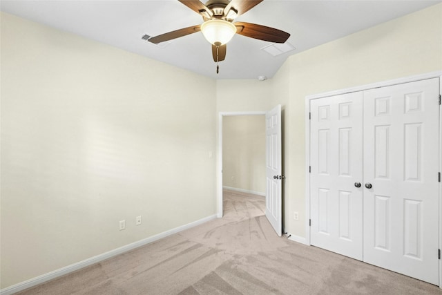 1403 Roaring Frk, Leander, TX 78641 - unfurnished bedroom with light carpet, a closet, and a ceiling fan