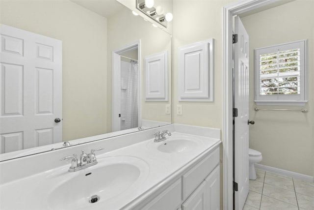 1403 Roaring Frk, Leander, TX 78641 - bathroom with double vanity and toilet