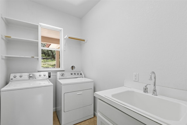 1403 Roaring Frk, Leander, TX 78641 - laundry area with washer and dryer and light tile patterned flooring