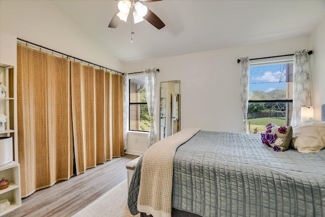 11901 Swearingen Dr Unit 4, Austin, TX 78758 - bedroom with wood finished floors, lofted ceiling, and ceiling fan