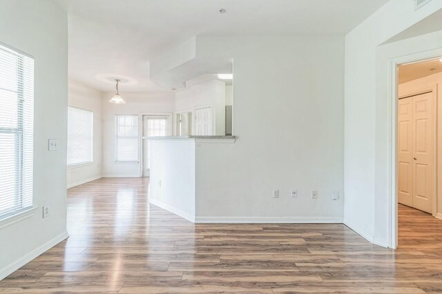 2320 Gracy Farms Ln Unit 522, Austin, TX 78758 - spare room with wood finished floors and baseboards