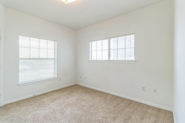2320 Gracy Farms Ln Unit 522, Austin, TX 78758 - carpeted empty room featuring baseboards
