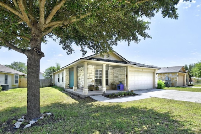 106 Wild Plum, San Marcos, TX 78666 - single story home with covered porch, stone siding, a garage, and driveway