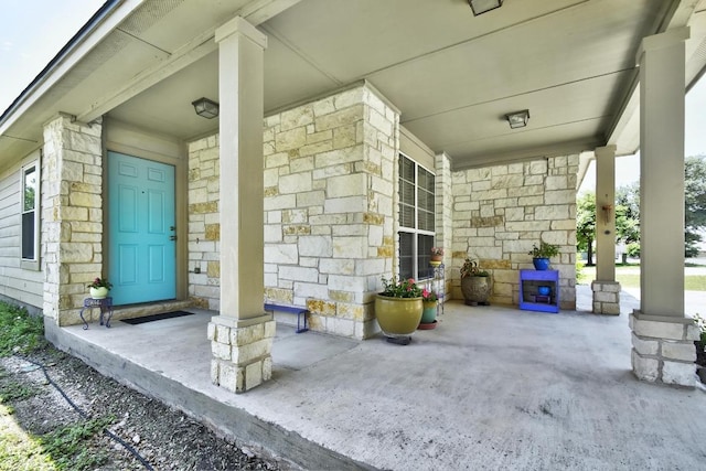 106 Wild Plum, San Marcos, TX 78666 - view of exterior entry with a porch and stone siding